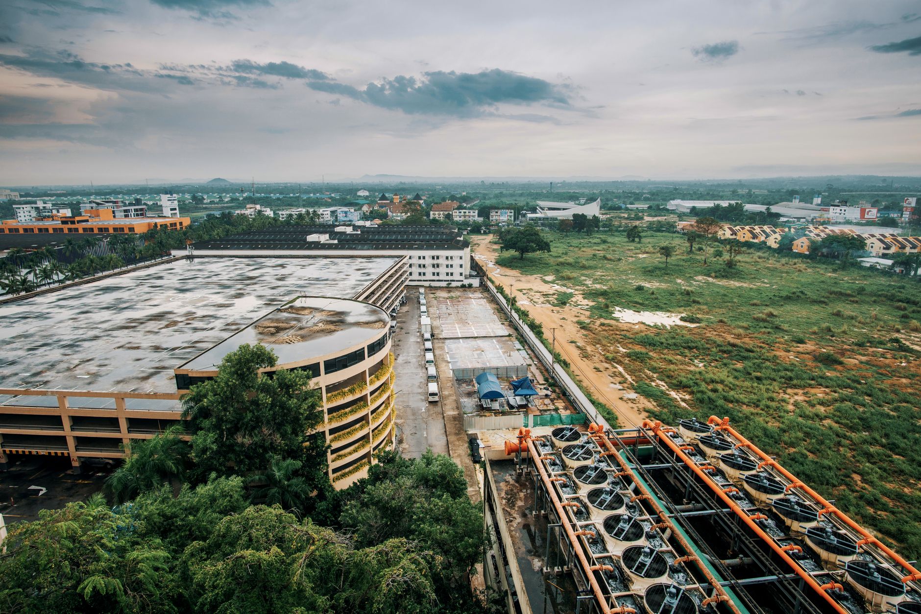 Rooftop commercial HVAC plant — industrial extract fans and insulated ventilation ductwork serving a building